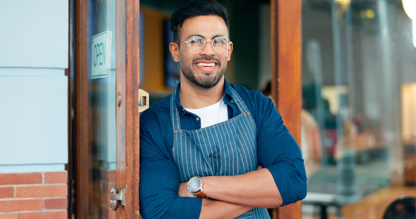 person of color at door with rekeyable IC Core (iStock-1820067861) 