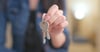 Image of woman holding keys for IC cores