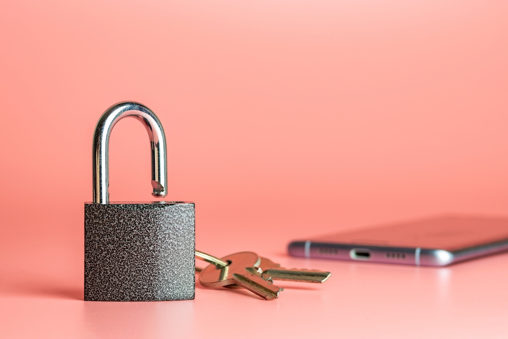 Blog image of a padlock, keys, and smartphone, representing key control preparedness 
