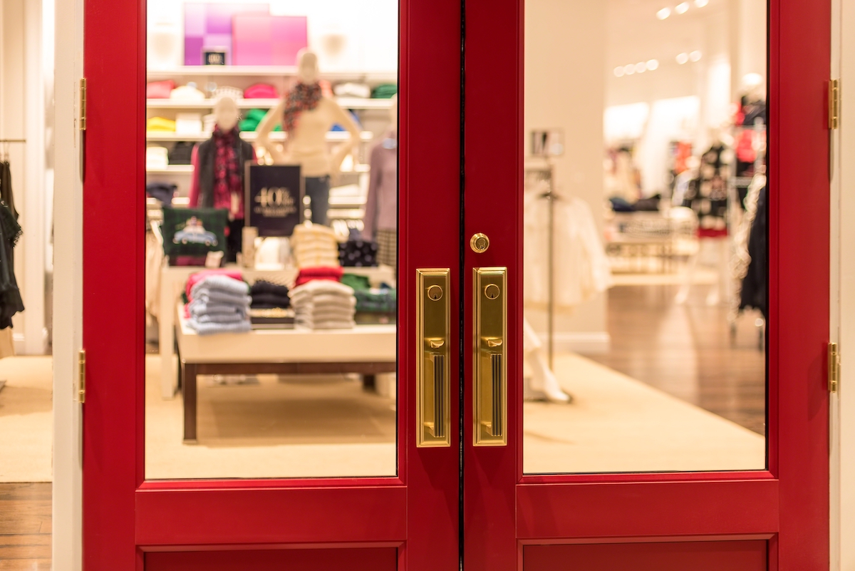 Image of a retail location's front doors, part of a master key system